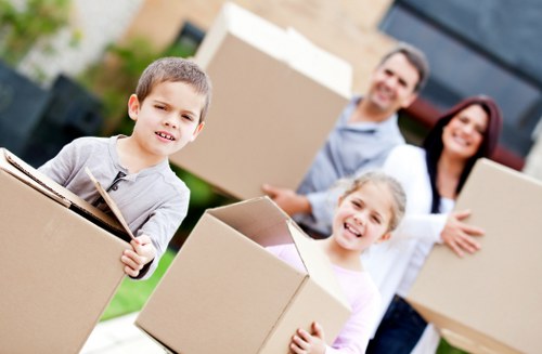 Packed boxes and furniture ready for a removal service