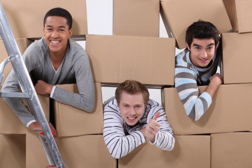 Team handling furniture in a London flat move