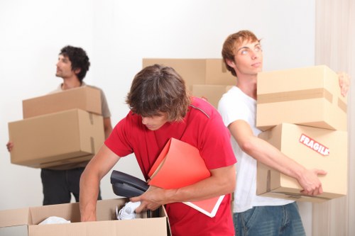 Removal crew loading business equipment for a Camden relocation