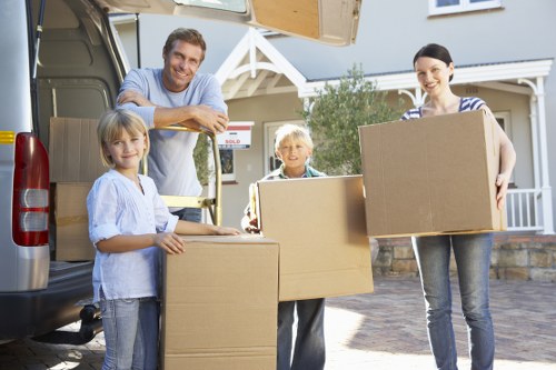 Loading furniture and boxes into a van for a Camden move