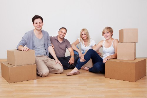 Prepared boxes and furniture ready for a home move in Camden