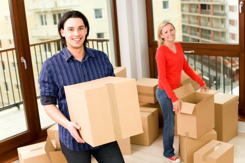 Moving team handling stairs in a Camden flat or converted property